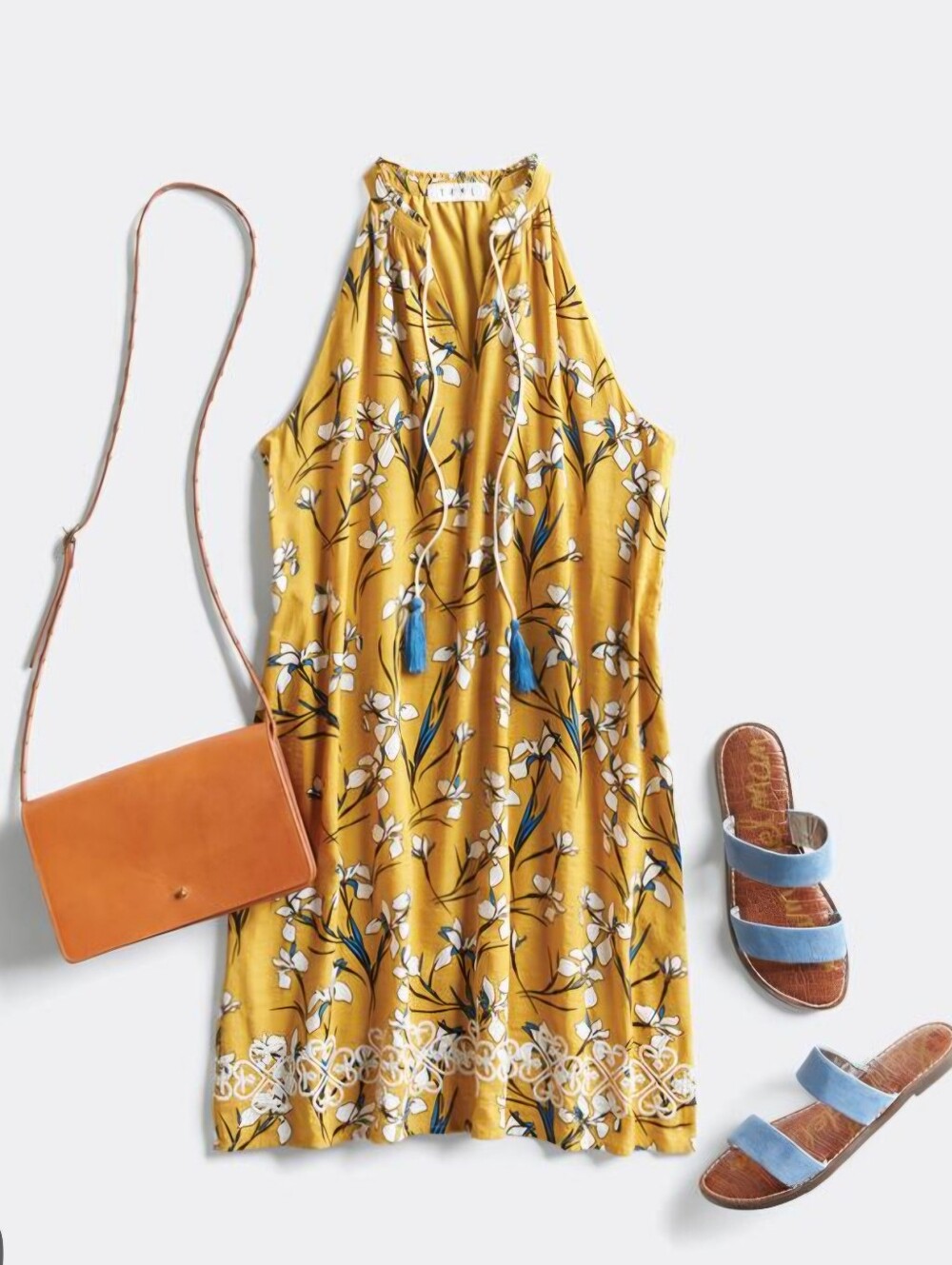 THML mustard-yellow halter garment  features an all-over floral print Size Large